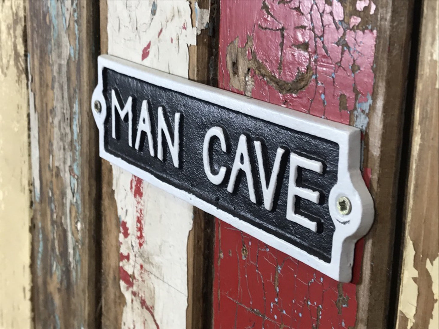 Cast Iron Sign MAN CAVE Black Background With White Text & Border