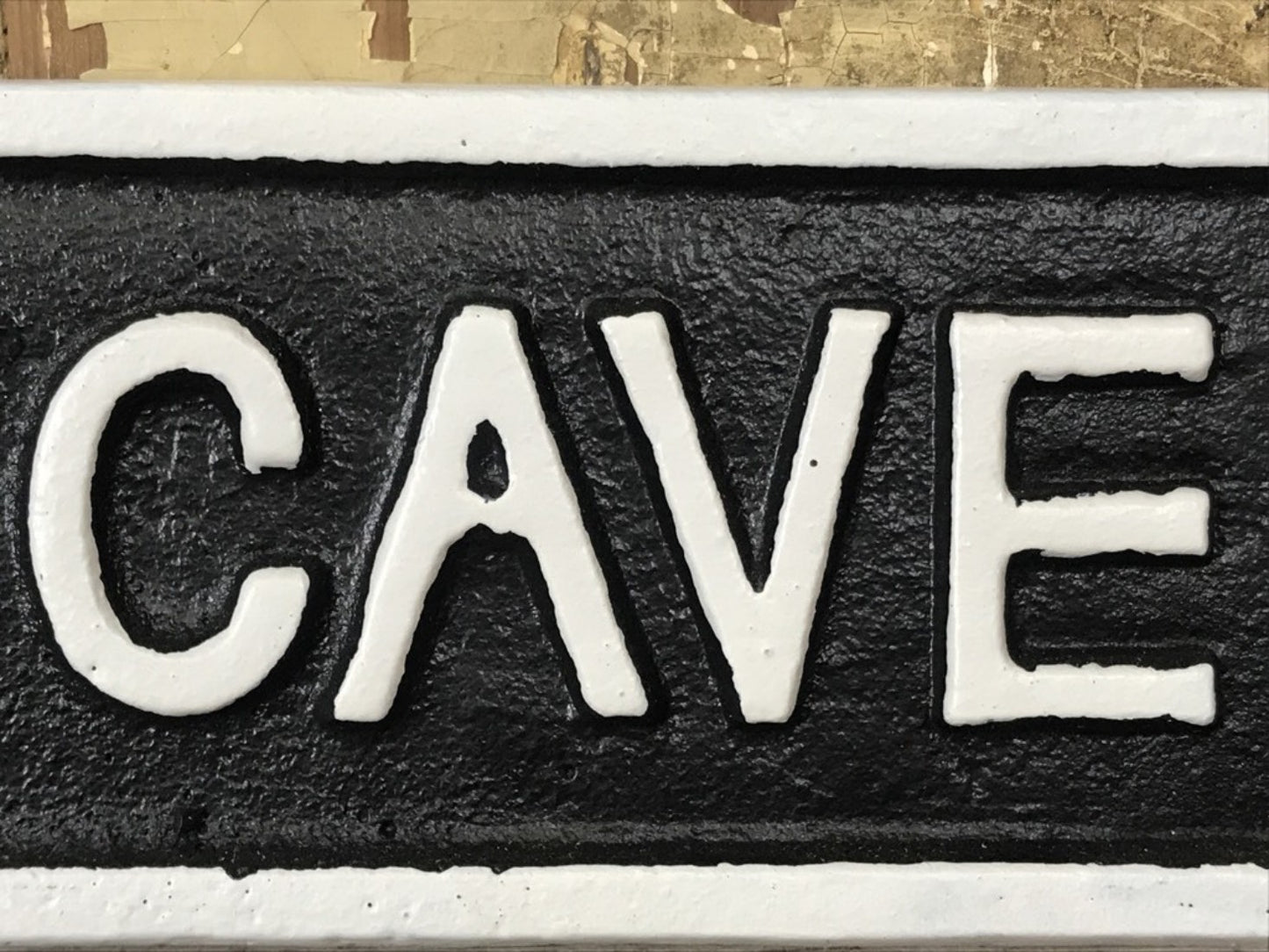 Cast Iron Sign MAN CAVE Black Background With White Text & Border