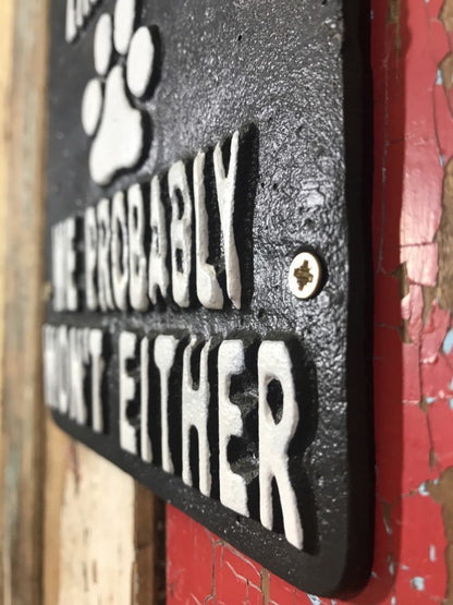 IF OUR DOGS DON'T LIKE YOU WE PROBABLY WON'T EITHER, Black Cast Iron Wall Sign
