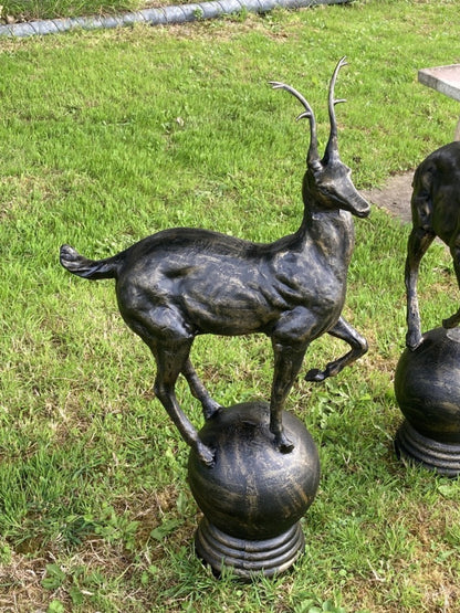 Bronzed Cast Iron Pair of Small Stags On a Ball Sphere Garden Or Gateway