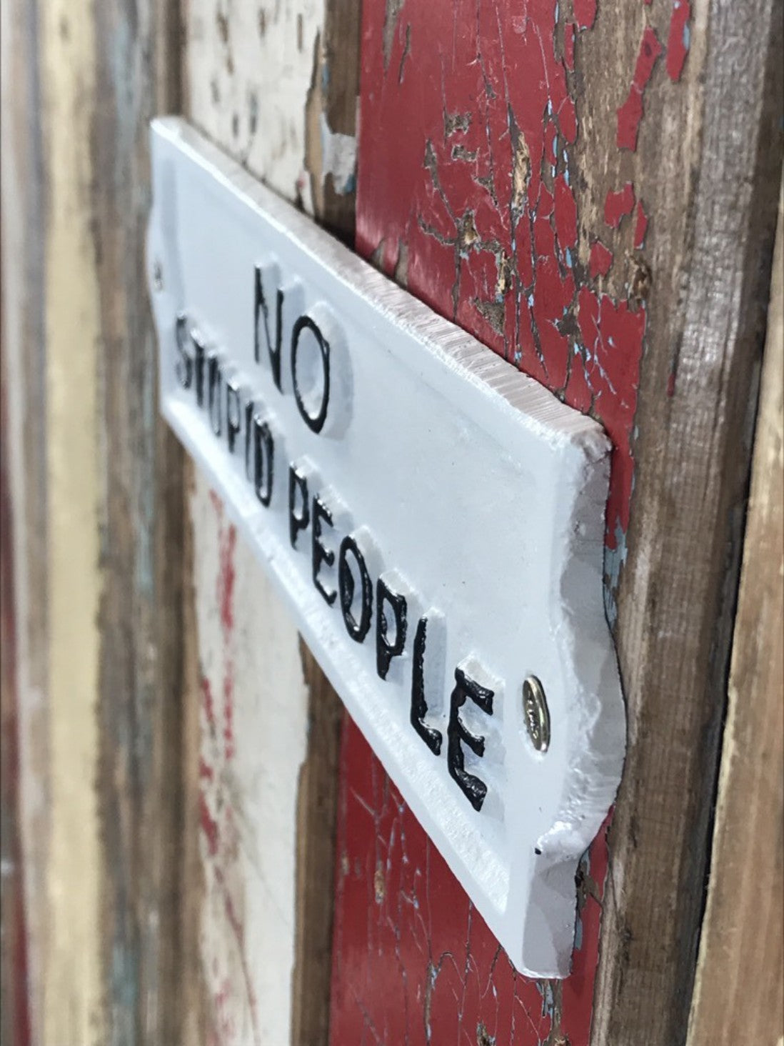 White With Black Text NO STUPID PEOPLE Wall Sign Cast Iron