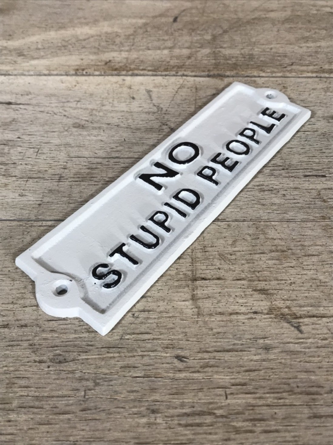 White With Black Text NO STUPID PEOPLE Wall Sign Cast Iron