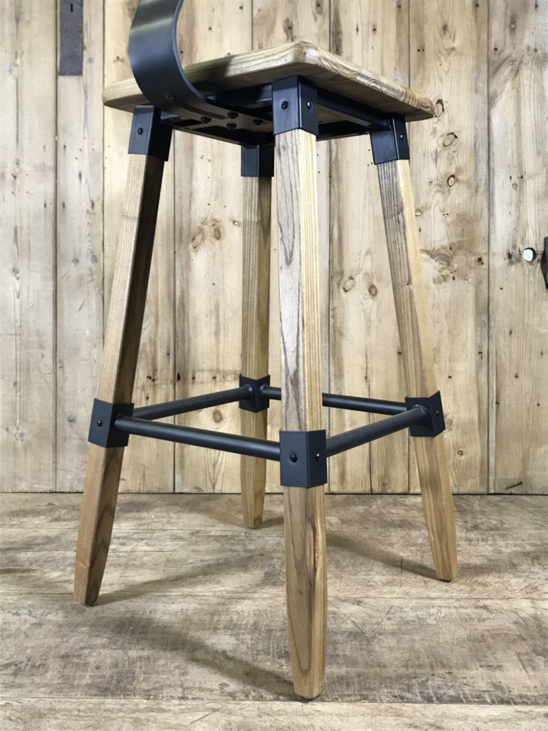 Wooden bar stool with a back and four splayed legs Somerset Shop